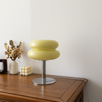 Eleve o Seu Espaço com um Toque de Elegância Moderna A Luminária de Mesa Moderna de Vidro e Inox é a união ideal entre elegância e resistência.